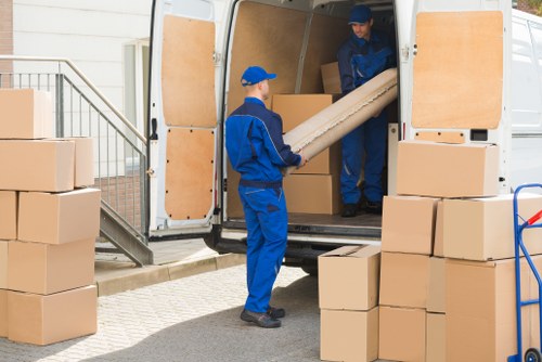 Removal team loading furniture for a same-day move in Greenwich