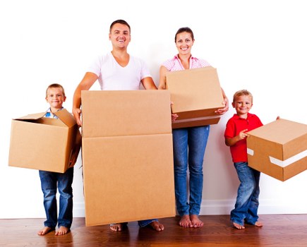 Moving crew using protective equipment while loading furniture
