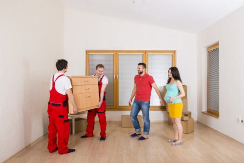 Careful handling of bulky furniture during a Greenwich removal job