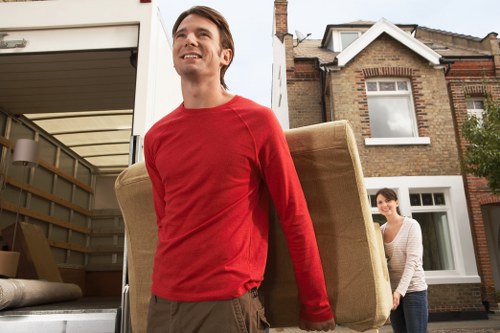 Furniture and boxes being transported by a Greenwich man and van team