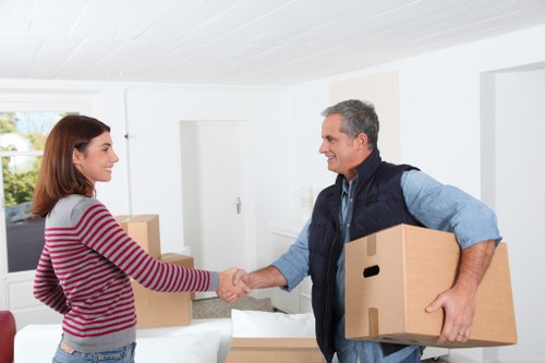 Greenwich moving service preparing boxes and furniture for transport