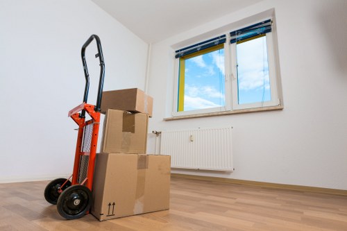 Checklist and labelled crates prepared for a business move