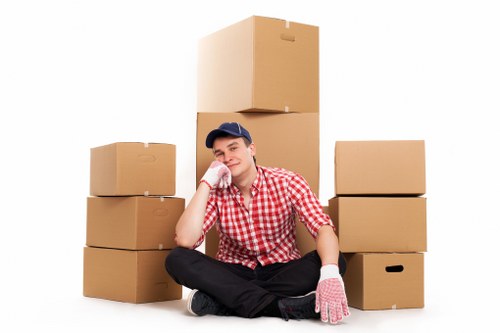 Organised room-by-room packing for a move in Greenwich with labelled boxes