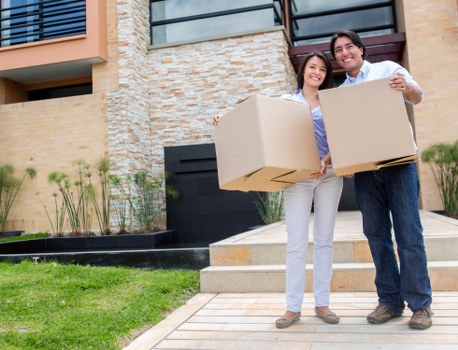 Removal crew loading furniture for a scheduled UK move